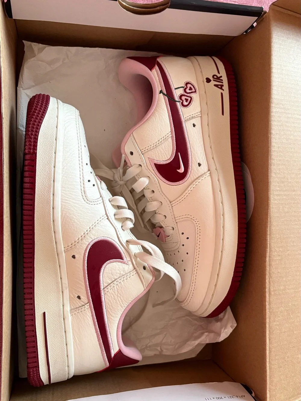 Nike Kids White and Pink Low-Top Sneakers with Maroon Swoosh